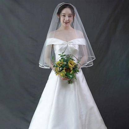 A word shoulder satin light wedding dress new Sen line brigade shoot super fairy fish tail repair thin bride out of the dress girl.