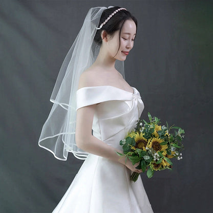 A word shoulder satin light wedding dress new Sen line brigade shoot super fairy fish tail repair thin bride out of the dress girl.