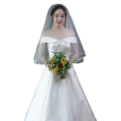 A word shoulder satin light wedding dress new Sen line brigade shoot super fairy fish tail repair thin bride out of the dress girl.
